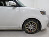 2008 scion xb  tire chains on road only titan chain snow - diamond pattern square link assisted tensioning 1 pair