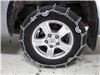 2008 toyota tundra  tire chains on road only titan chain w/ cams - ladder pattern twist link assisted tensioning 1 pair