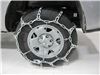 2018 toyota tacoma  tire chains on road or off titan chain mud service - ladder pattern twist link manual tensioning 1 pair