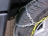 Titan Chain Alloy Snow Tire Chains - Diamond Pattern - Square Link - 1 Pair Drape Over Tire - Make Connections TC2526 on 2017 Jeep Wrangler Unlimited 
