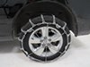 TC2828CAM - Assisted Titan Chain Tire Chains on 2015 Ram 1500 