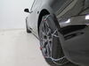 2020 tesla model 3  tire chains steel d-link on a vehicle