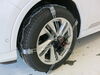 2020 audi q7  tire chains steel d-link w ice spikes on a vehicle