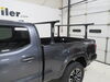 2021 toyota tacoma  truck bed over the thule xsporter pro adjustable height ladder rack - aluminum 450 lbs black