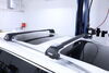 2023 kia telluride roof rack thule aero bars on a vehicle