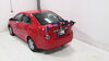 2013 chevrolet sonic  frame mount - anti-sway thule passage trunk bike rack for 2 bikes hanging style