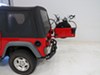 1997 jeep wrangler  frame mount - anti-sway dual arm thule spare me 2 bike rack tire folding arms