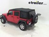 2014 jeep wrangler unlimited  frame mount - anti-sway dual arm thule spare me 2 bike rack tire folding arms