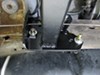 2003 ford f-250 and f-350 super duty truck camper tie downs torklift frame-mounted on a vehicle