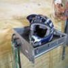 Tow-rax helmet shelf with motorcycle helmet. 