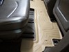 WeatherTech 2nd Row Rear Auto Floor Mat - Tan Rubber with Plastic Core WT451112 on 2010 GMC Acadia 