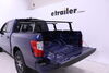 2023 nissan titan  truck bed over the yakima outpost hd overland rack - aluminum 500 lbs 68 inch crossbars