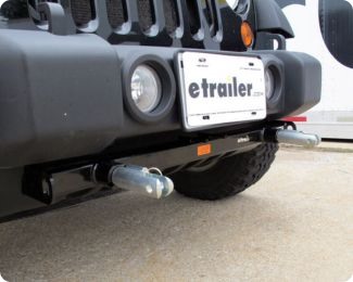 Blue Ox Base Plate Kit on front of Jeep. 