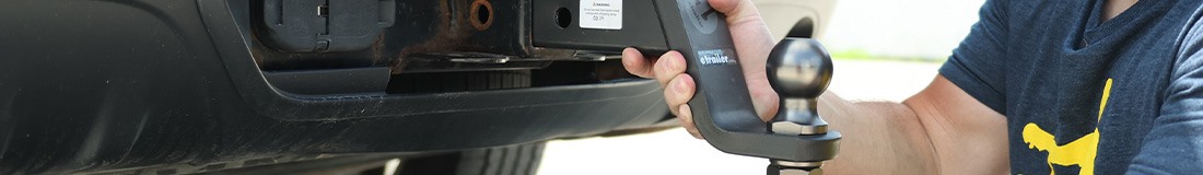 Closeup of Draw-Tite ball mount mounted on the back of a vehicle.