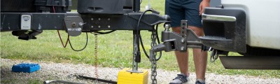 trailer being attached to truck's coupler. 