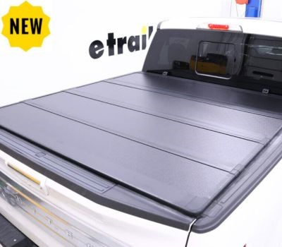 etrailer Hard Tonneau Cover on white truck. 